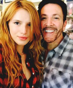 With Bella Thorne