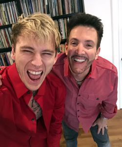 With Machine Gun Kelly